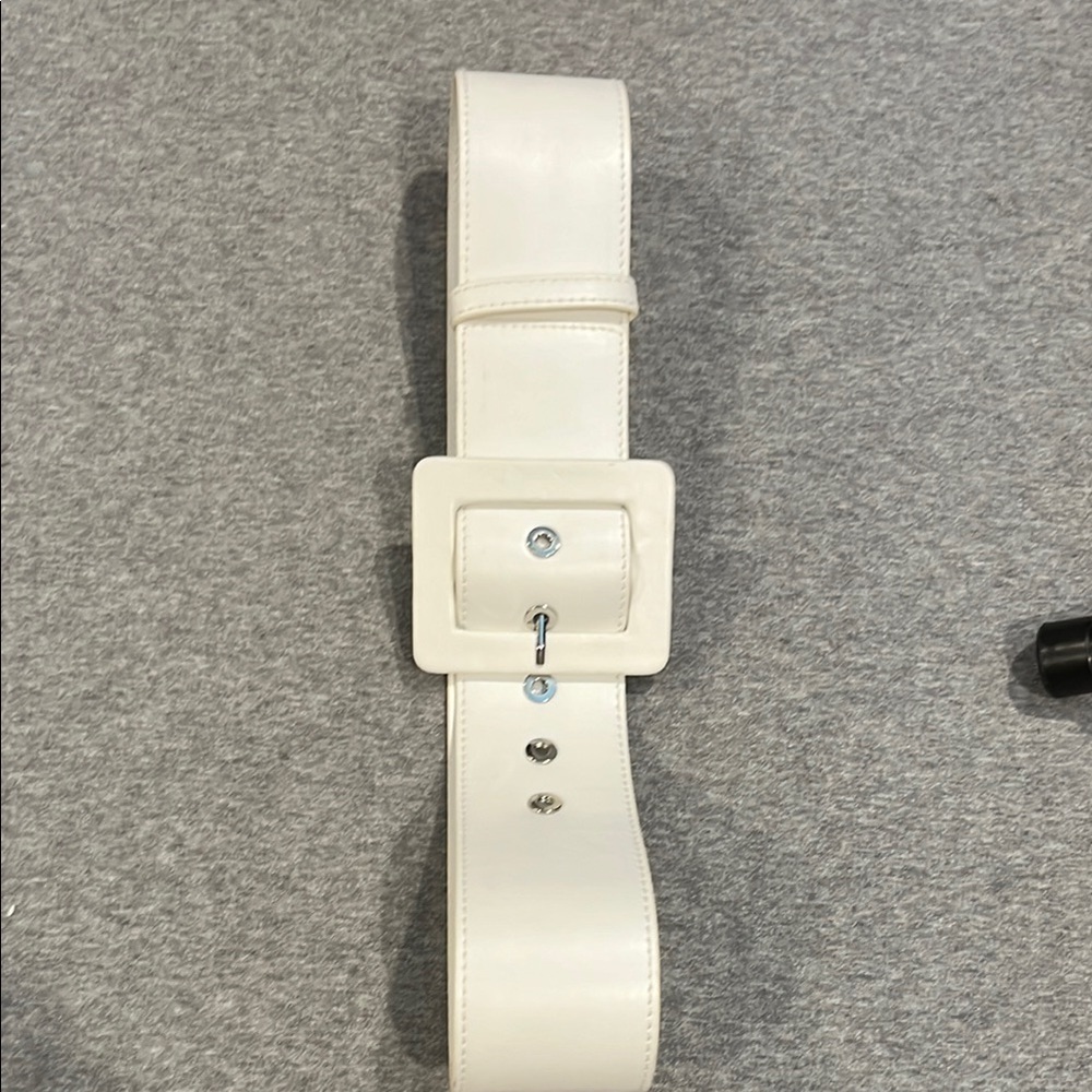 Michael Kors white wide belt.